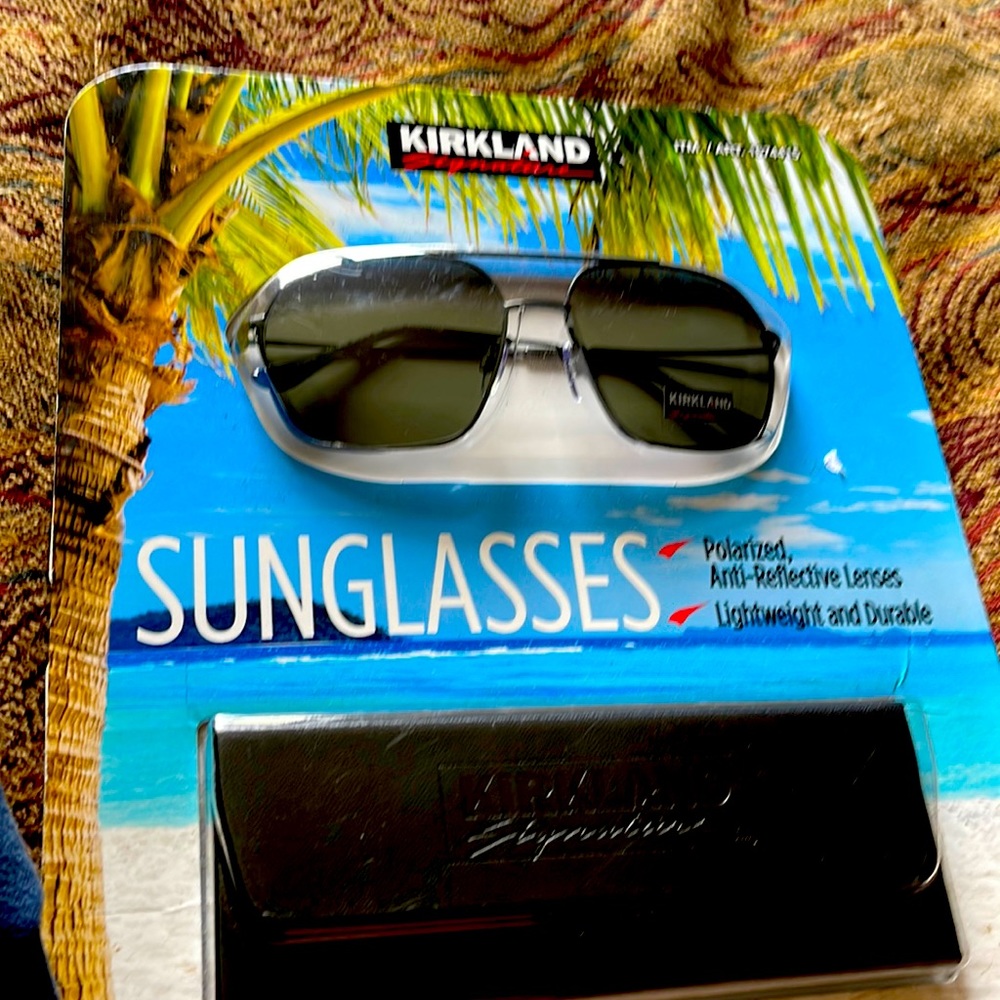 Brand new Kirkland aviator sunglasses with polarized lenses